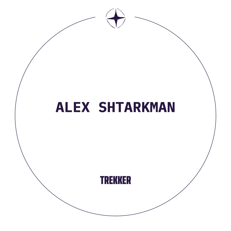 This is a minimalist circular logo featuring the name "ALEX SHTARKMAN" in large, dark purple sans-serif capital letters. Below the name, also in dark purple capital letters, is the word "TREKKER". At the very top of the circle, centered, is a small, stylized compass rose or star symbol. The overall design is clean and modern, suggesting adventure or travel.